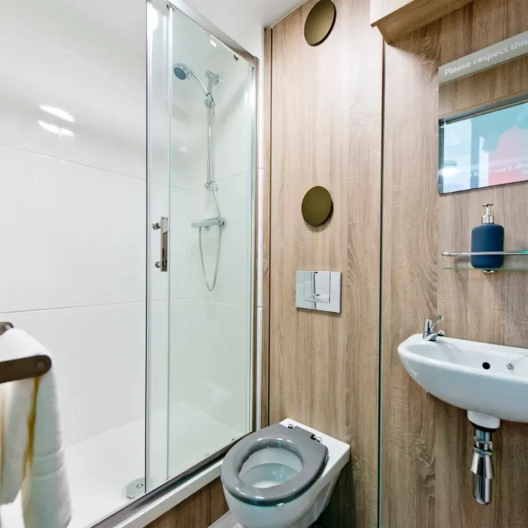 BOXFab Sleeping Unit: Spacious full-height shower room completes the double bed & kitchen.