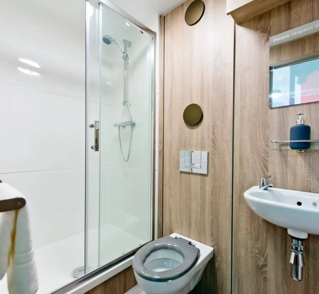 Sleeping Unit: Spacious full-height shower room completes the double bed & kitchen.